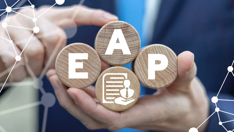 man holding the letters E, A, and P
